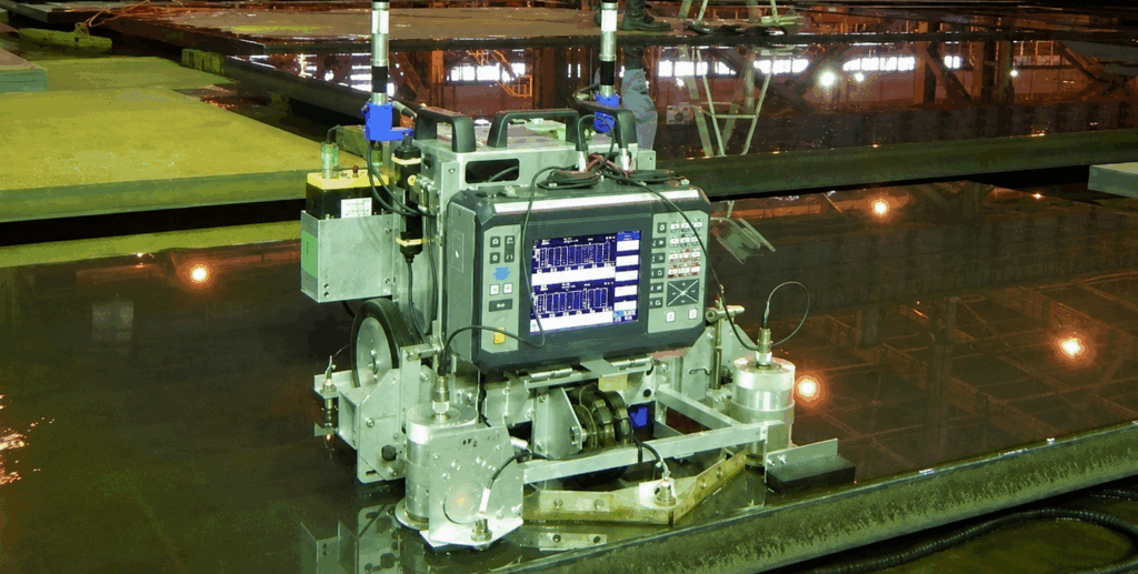 JFEスチール|厚鋼板を自律走行するUT-Robot